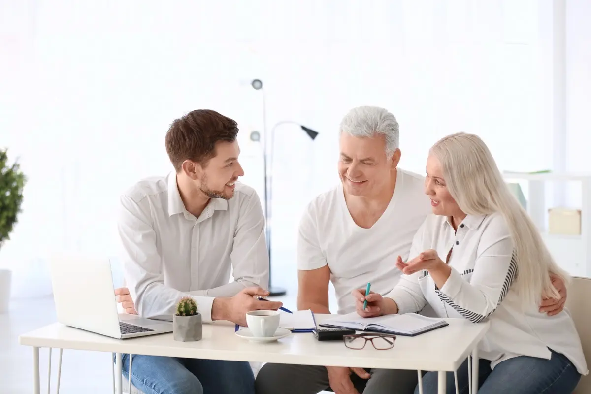 A couple reviewing their foundation structure with an adviser, the review the June 2026 guide makes worthwhile