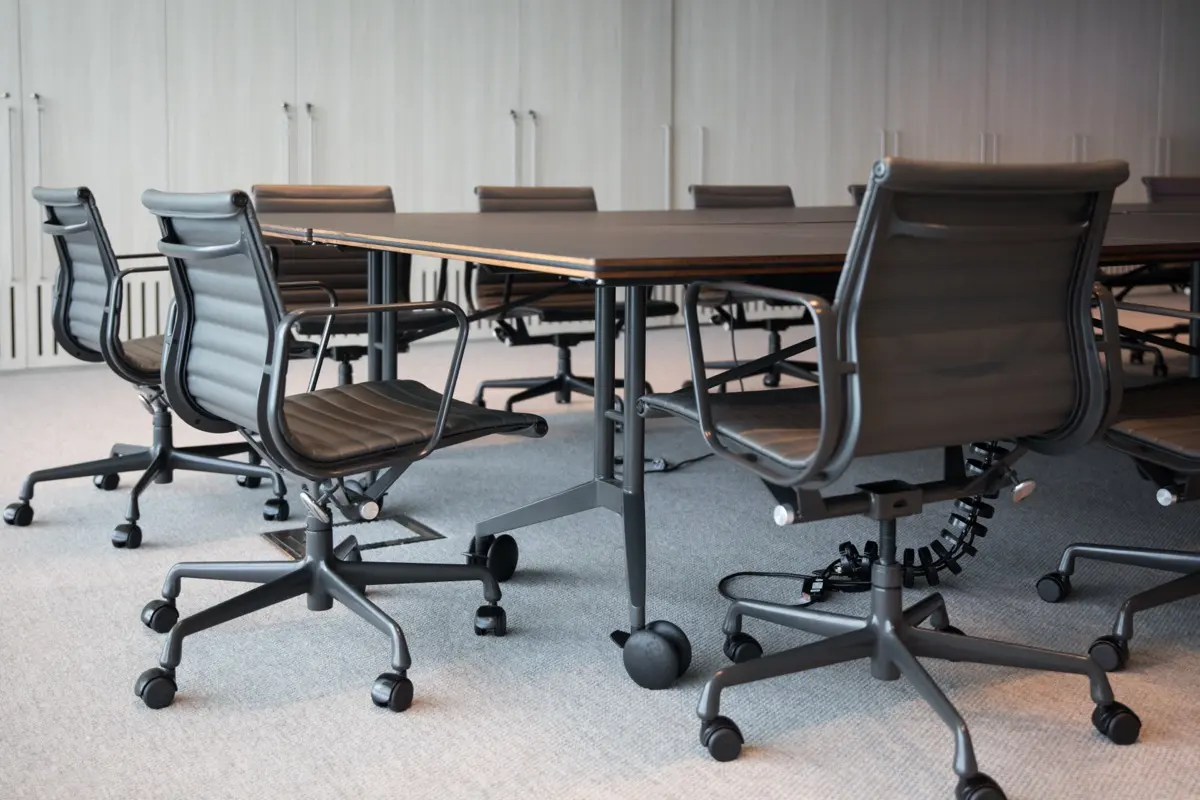 A modern boardroom where a resident director takes the decisions that support a company's UAE substance