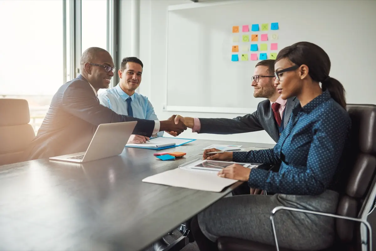 A sponsor and co-investors reaching agreement on a deal-by-deal structure