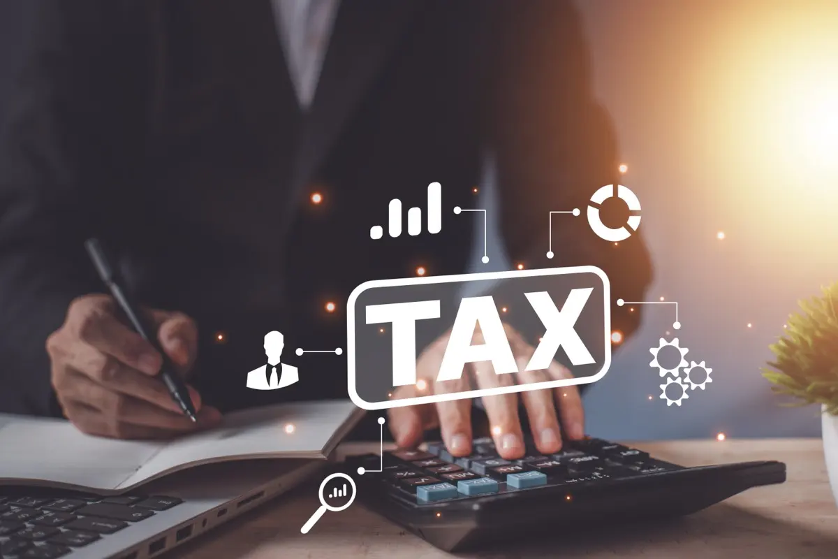 Corporate tax and VAT concept, representing the overlap of VAT changes, corporate tax returns and e-invoicing for UAE finance teams
